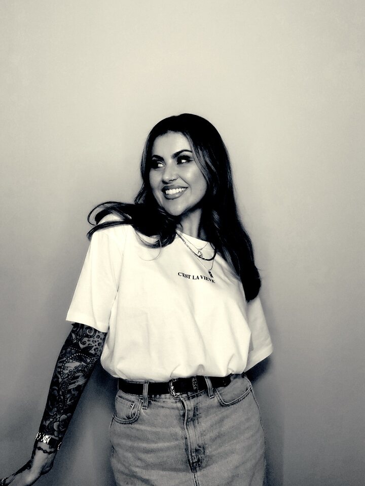 Guest posing for a monochrome Glam portrait