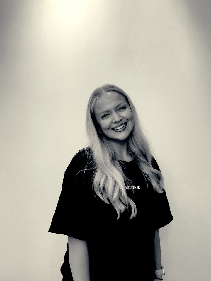 Smiling guest in a black and white Glam portrait