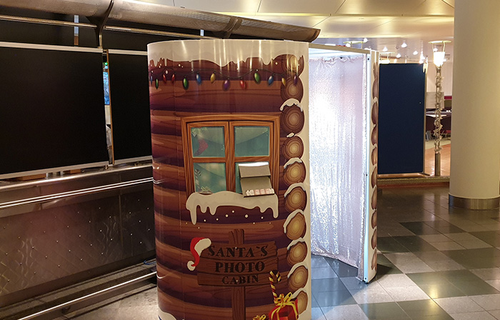 Santa's Cabin festive style on the enclosed Oval Photo Booth